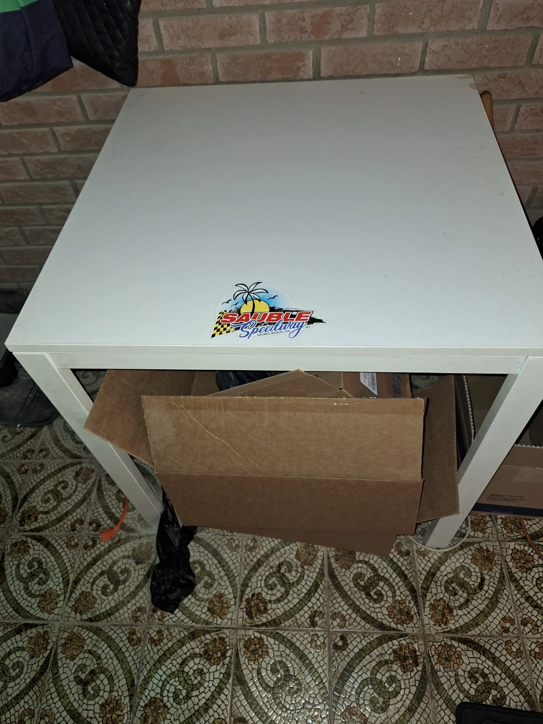 White Side Table with Sauble Speedway Sticker
