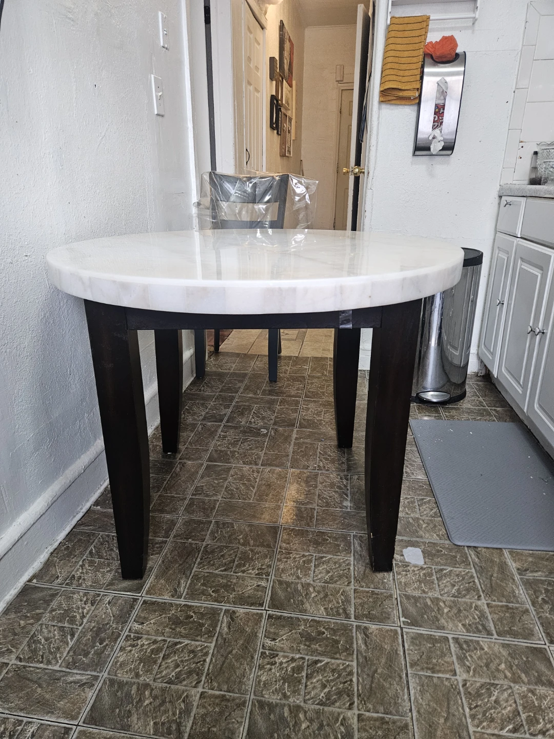 Round Marble Top Dining Table with Dark Wood Legs