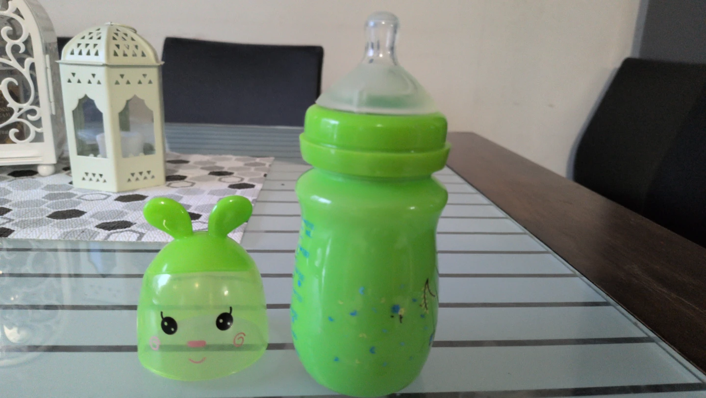 Green Baby Bottle with Bunny Cap - photo 2