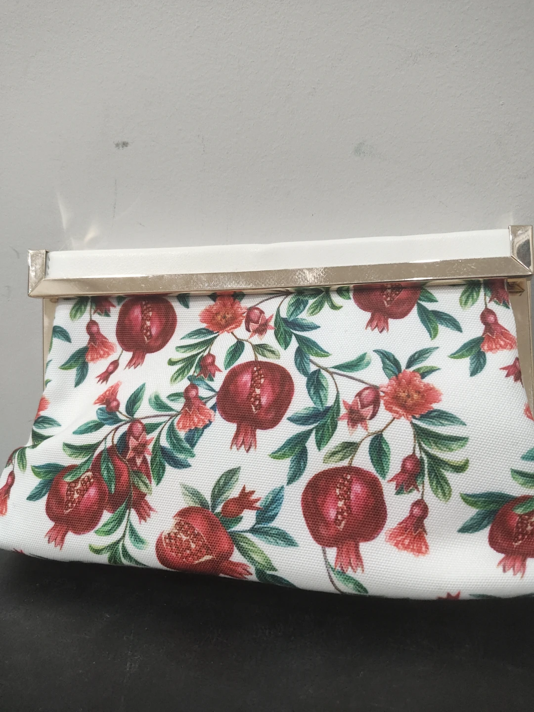 Clutch purse with pomegranate pattern