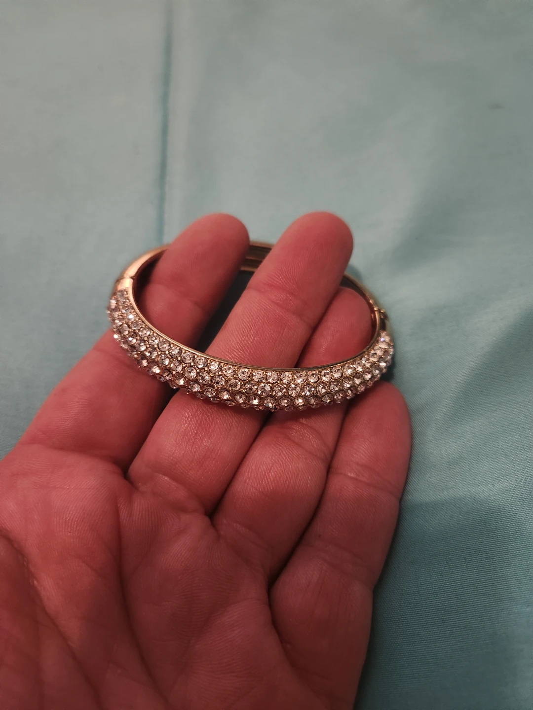 Sparkly gold-tone cuff bracelet with rhinestones