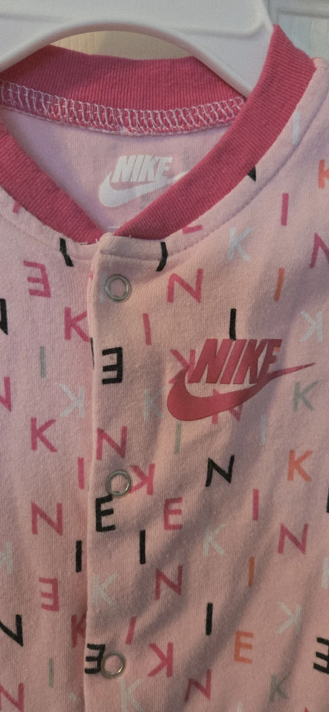 Nike Baby Sleeper Pink All-Over Logo Footie. 9 mo