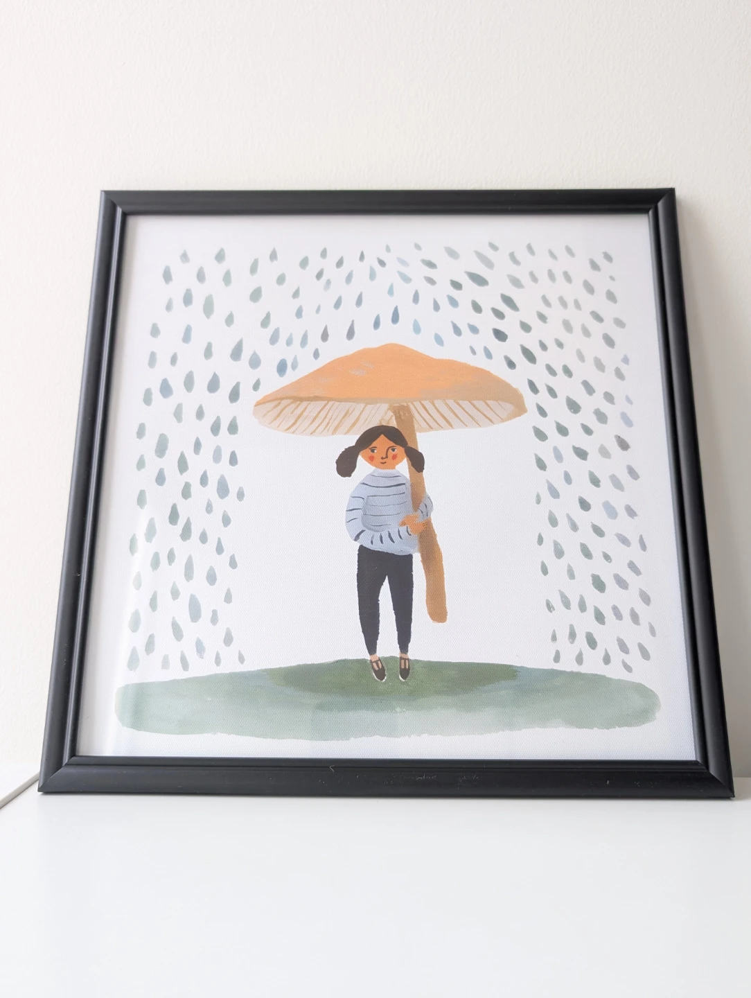 "It Rains" Framed "Girl with Mushroom Umbrella" canvas Print