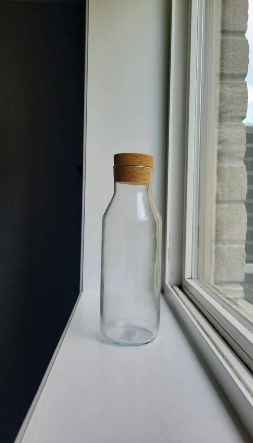 Glass bottle with cork stopper