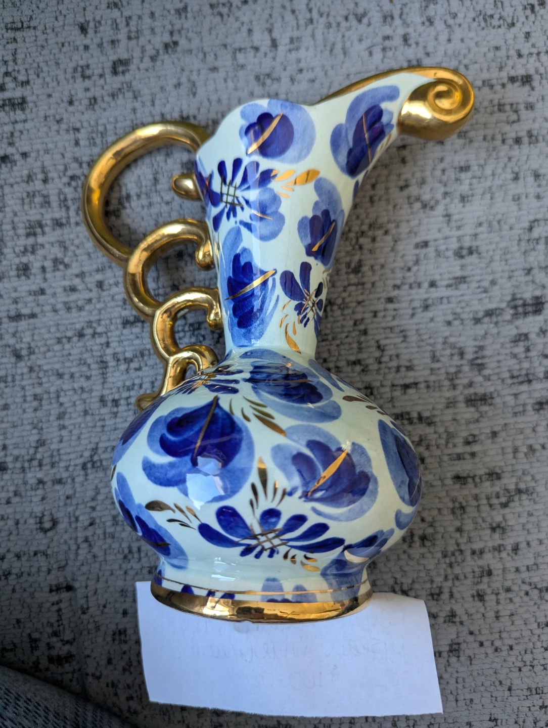 Decorative Blue and White Floral Pitcher with Gold Accents
