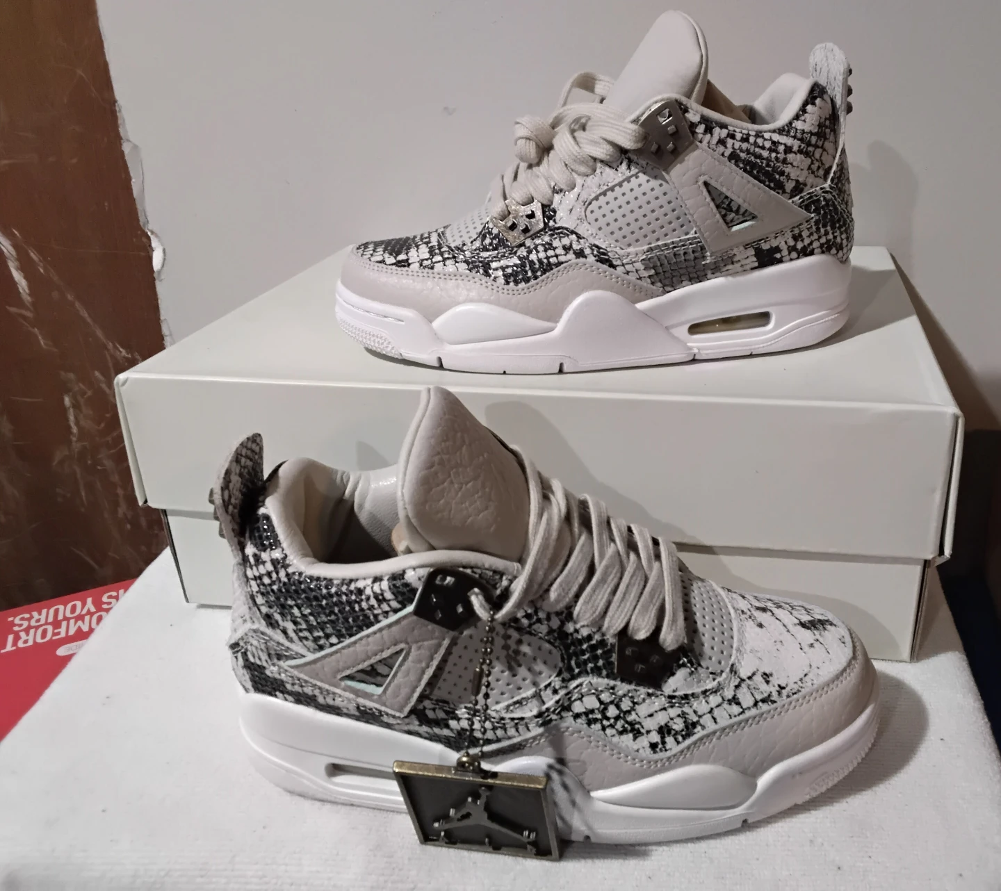 Jordan 4 Retro "Year of the Snake" Sneakers