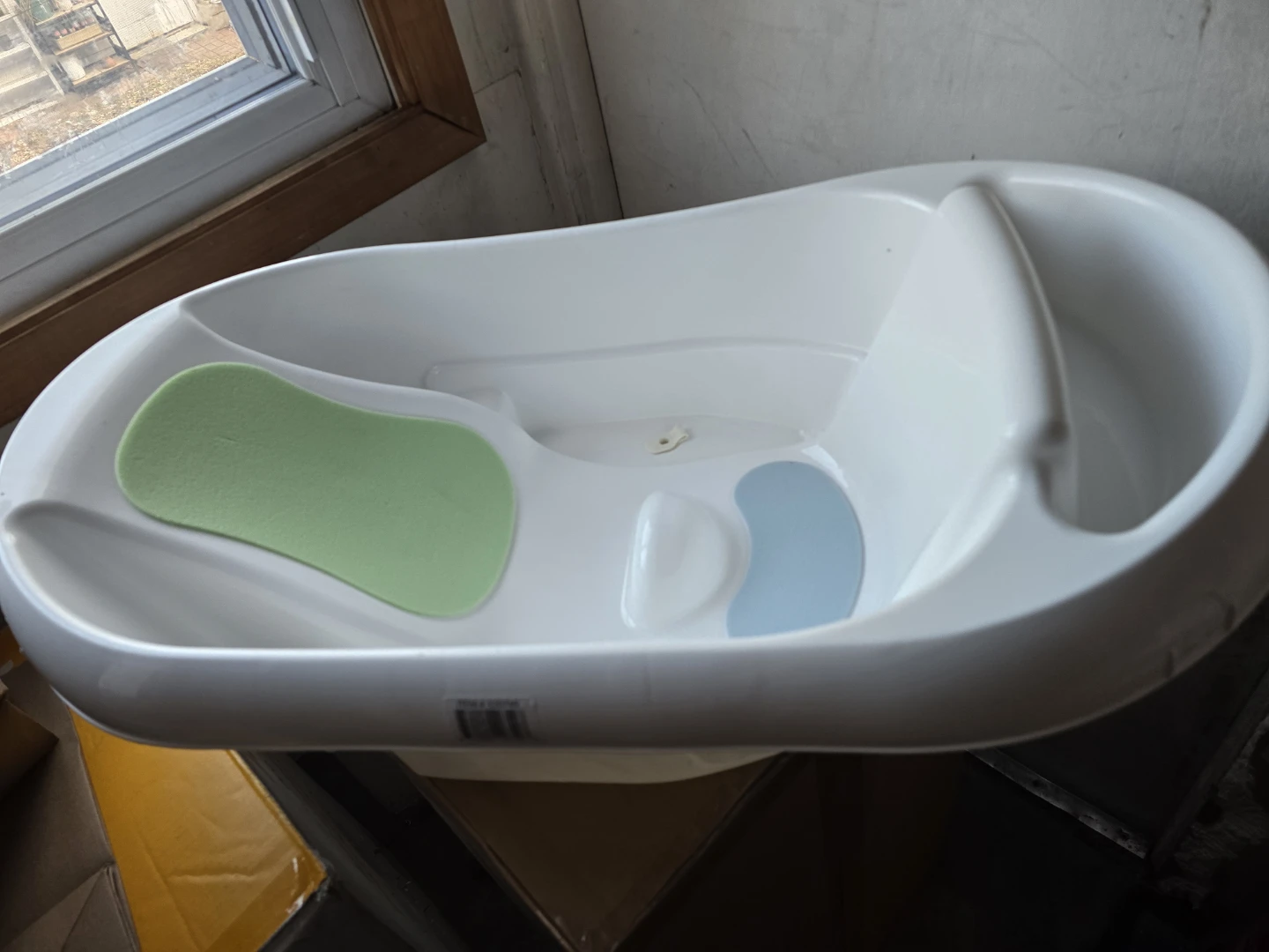 White Baby Bathtub with Green and Blue Inserts