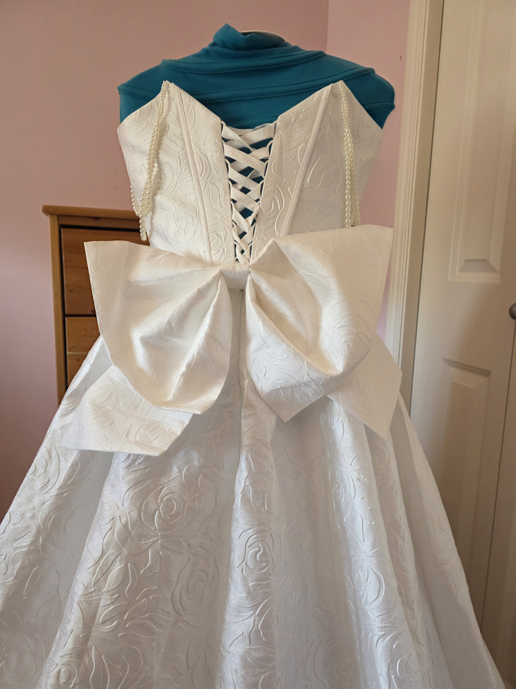 White Strapless Wedding Dress with Pearls and Bow Accent - photo 5