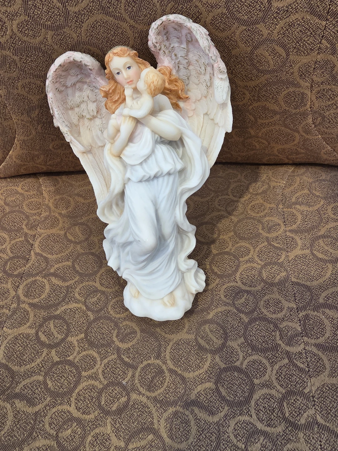 Angel Holding Baby Figurine