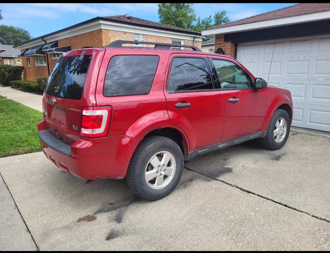 Red Ford Escape SUV - photo 4