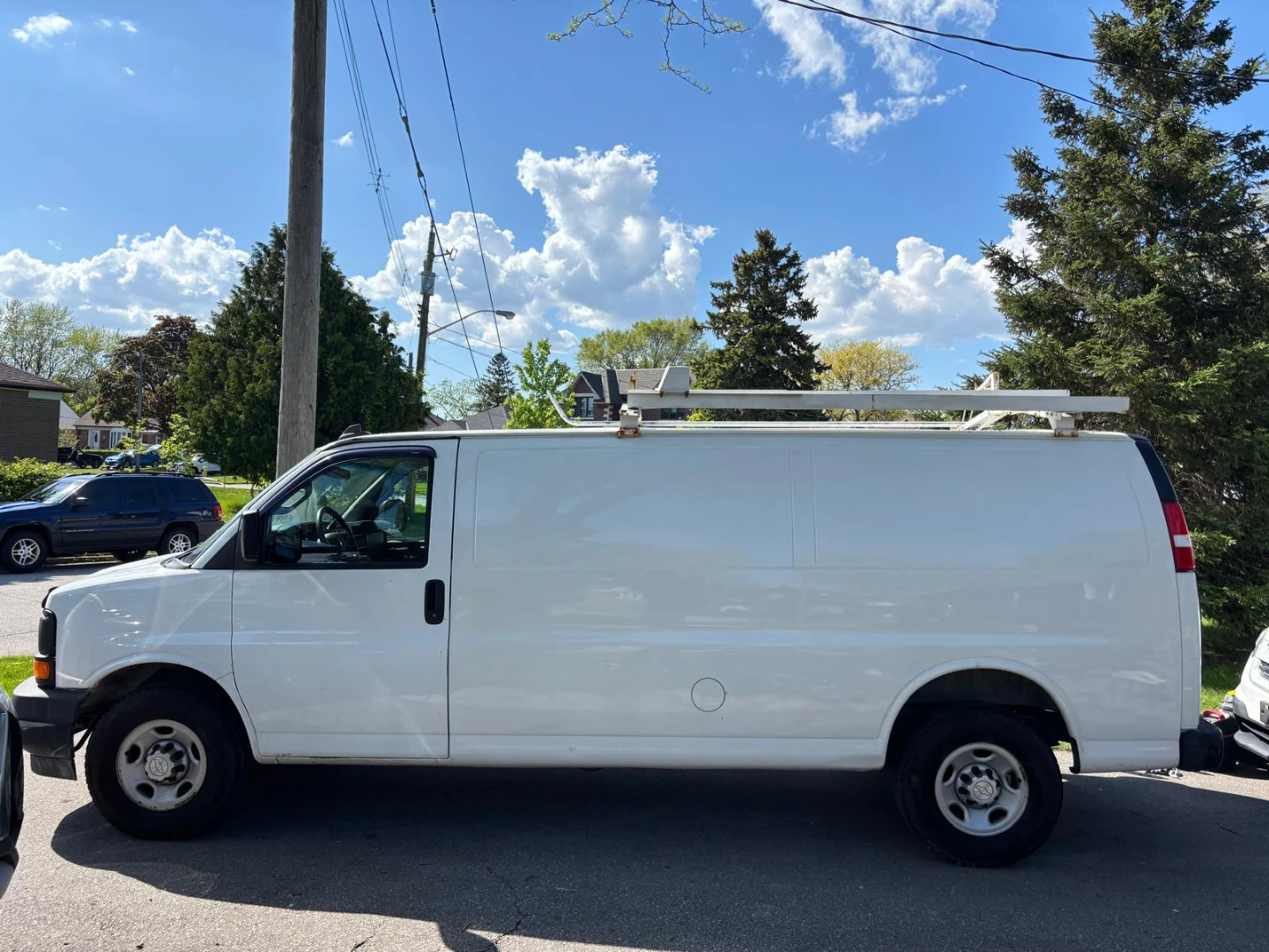 White Chevrolet Express Cargo Van - photo 2