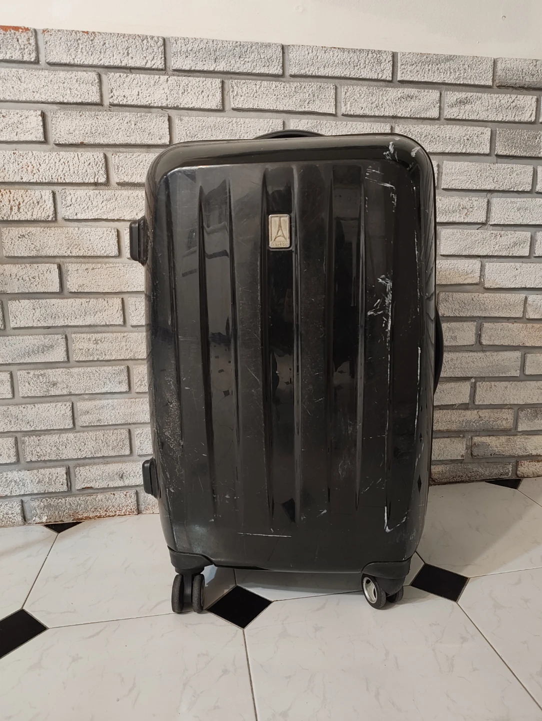 Black Travelpro Suitcase