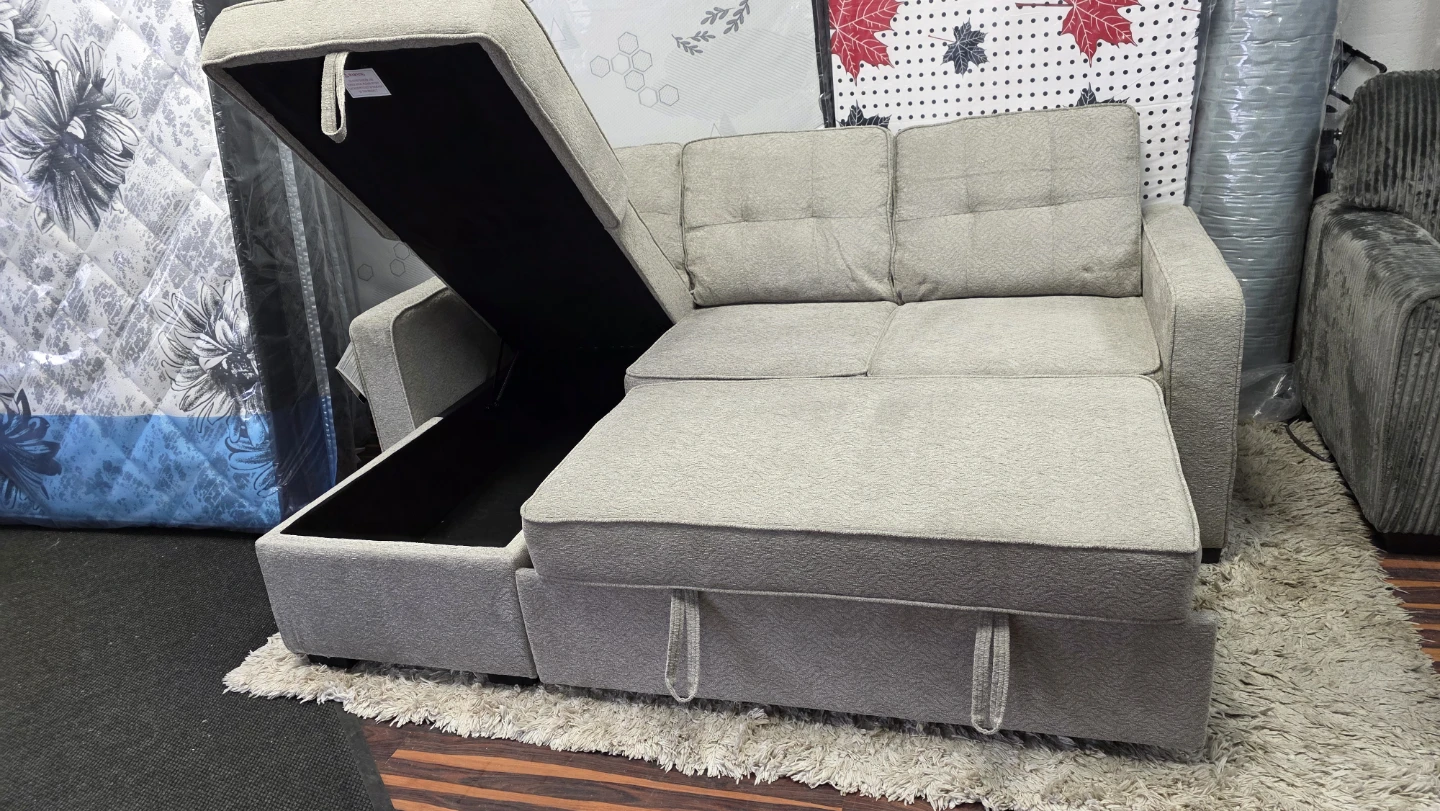 Brand new Light Grey Sectional Sofa with Storage and bed.