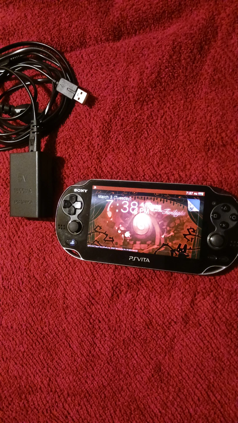 Sony PlayStation Vita Handheld Console with Charger