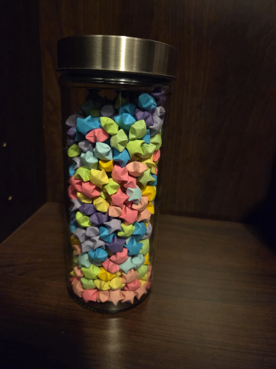 A bag of 500 handmade folded origami deli paper stars.