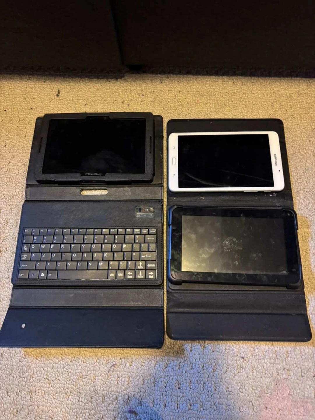 White Samsung Tablet and black, blackberry
