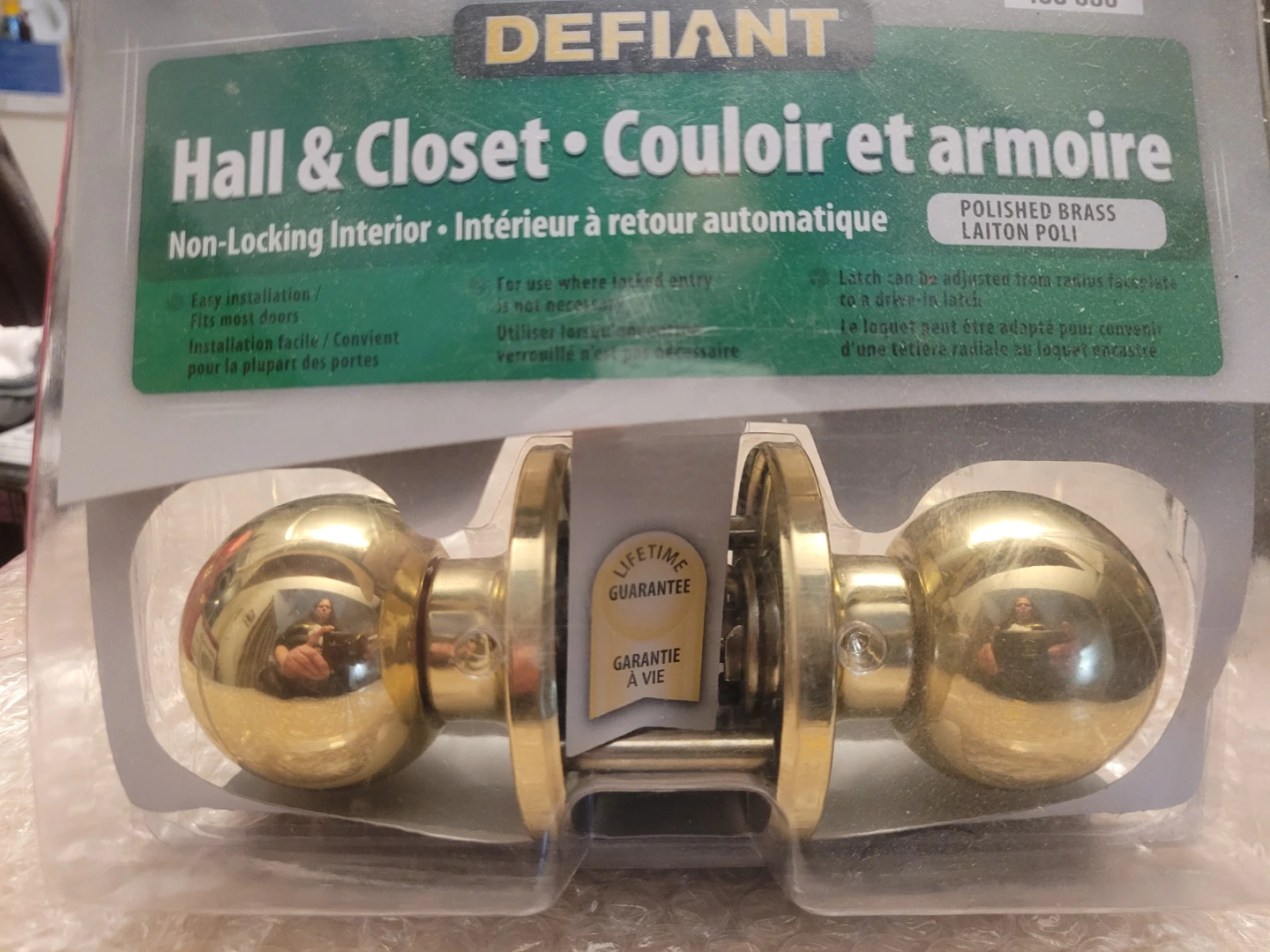 Defiant Polished Brass Hall & Closet Non-Locking Door Knobs