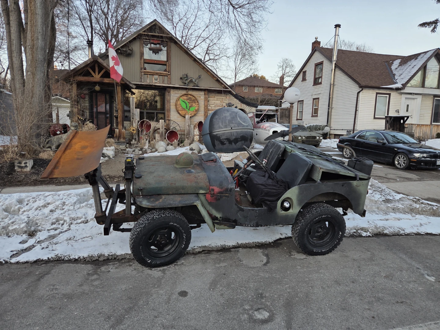 Modified Jeep with Snow Plow and Rack