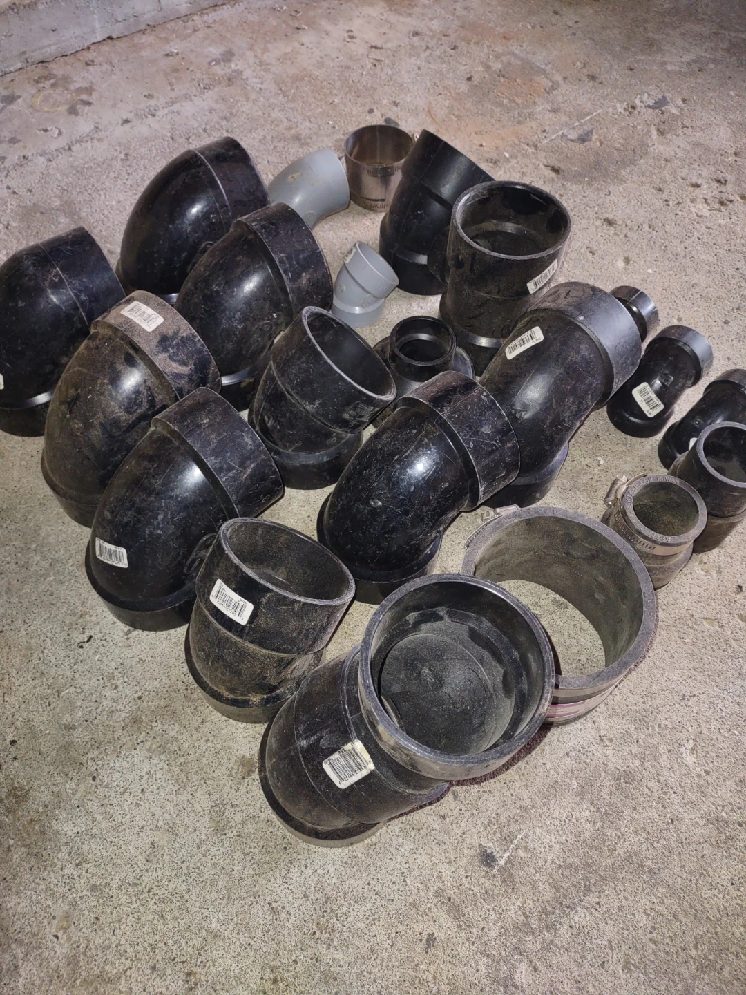Assorted Black PVC Pipe Fittings