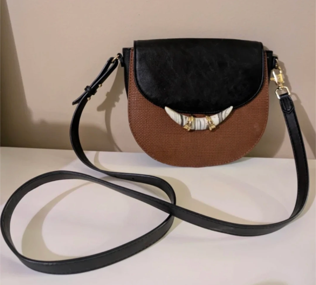 Brown and Black Saddle Bag with Tusk-like Clasp