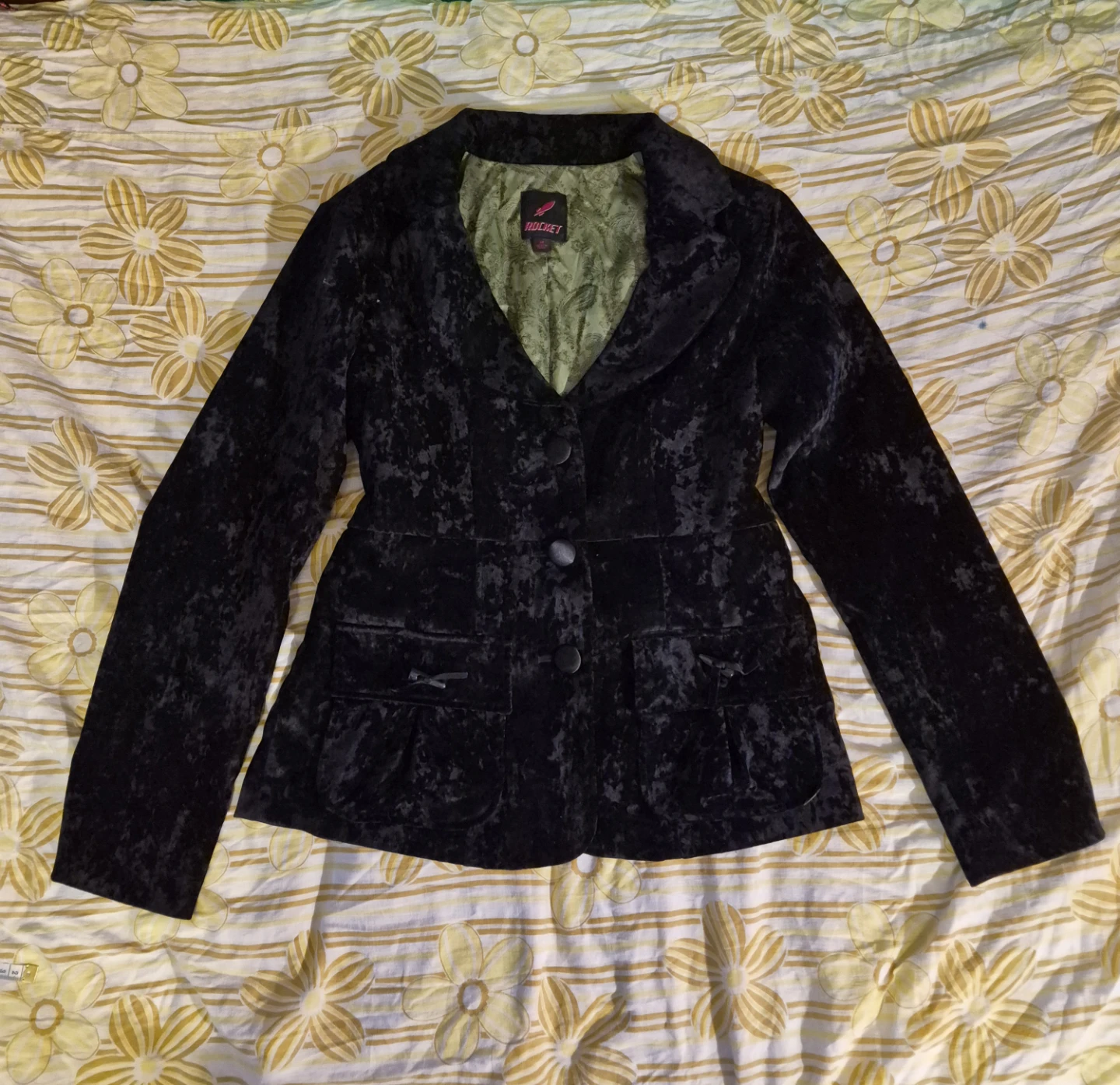 Black velvet blazer with button front and cinched waist