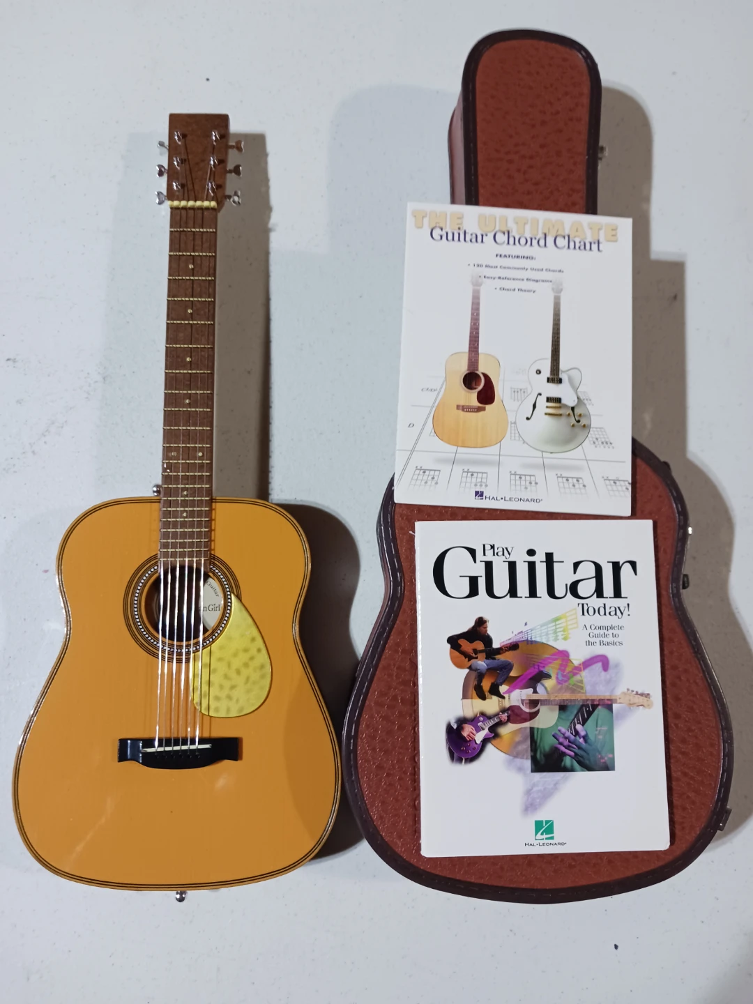 American girl guitar with play books