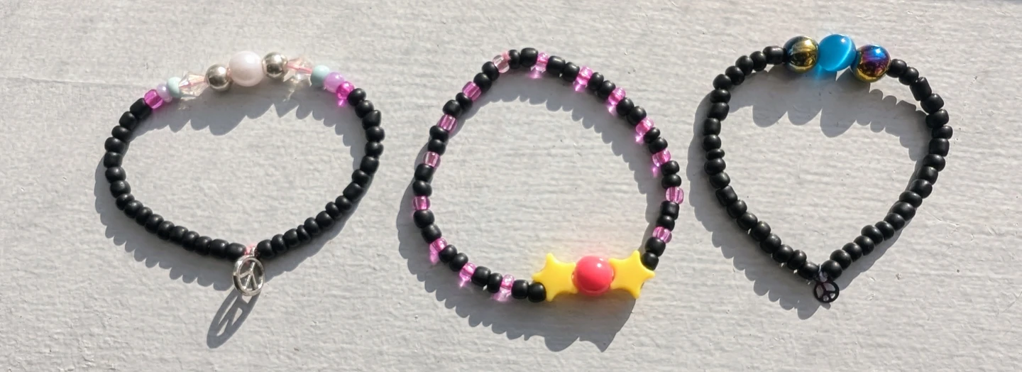 Set of 3 Beaded Bracelets with Charms
