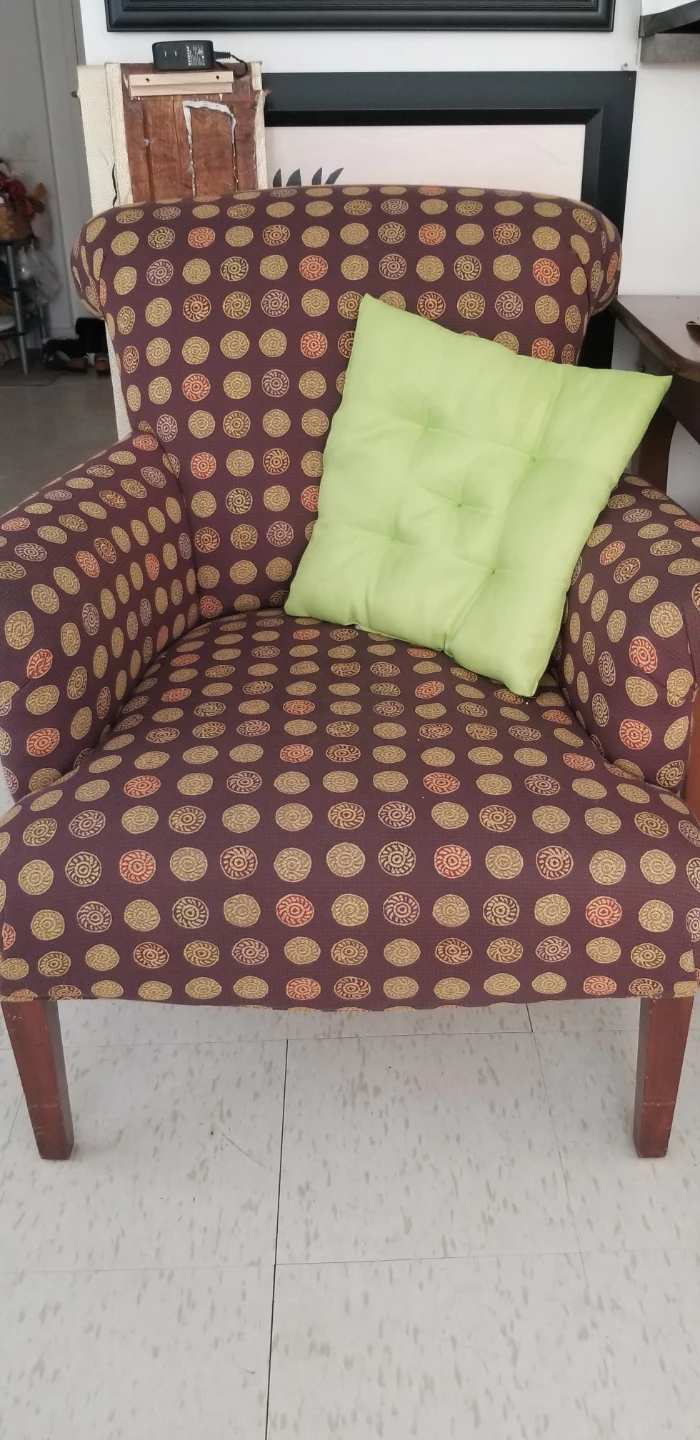 Armchair with patterned upholstery
