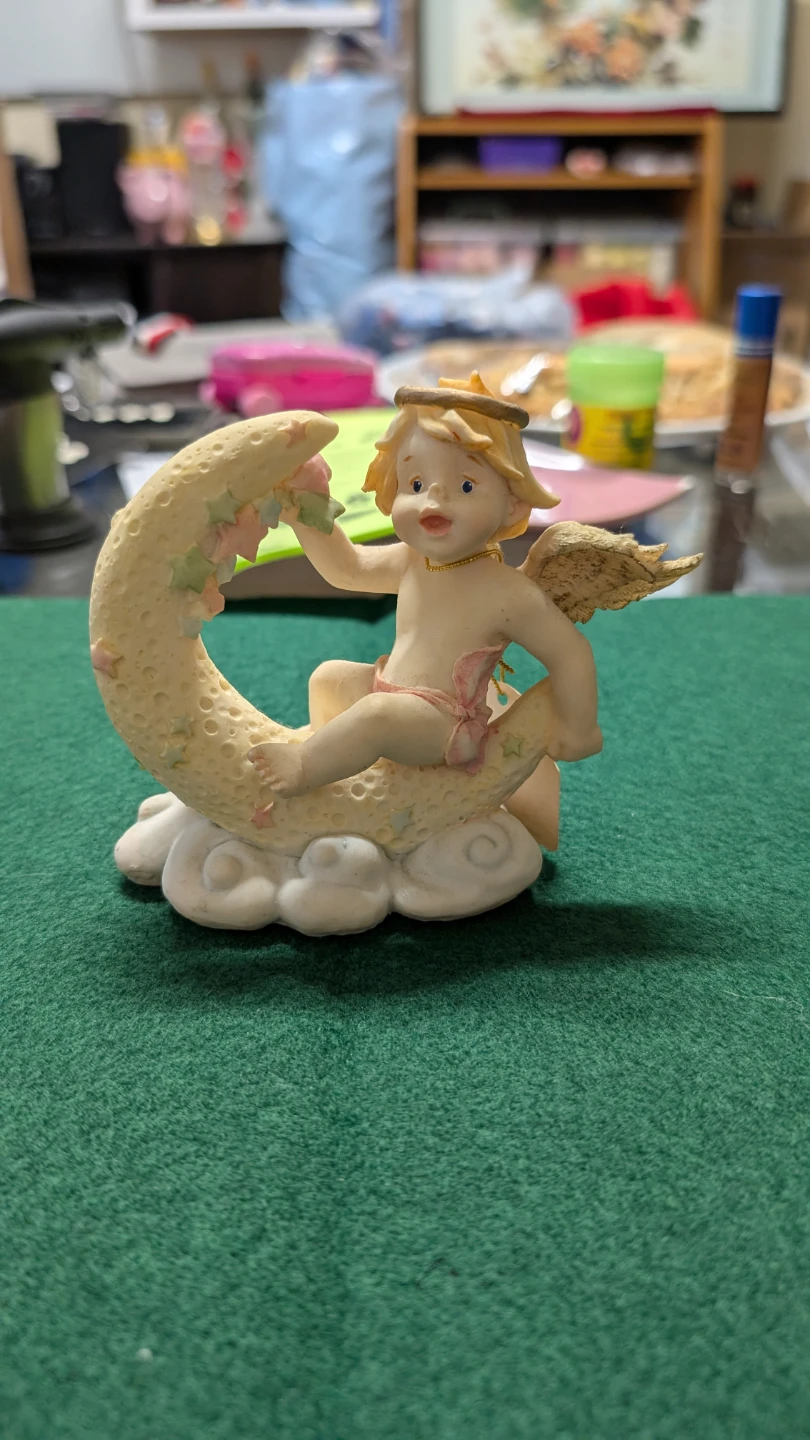 Cherub Figurine Sitting on Crescent Moon