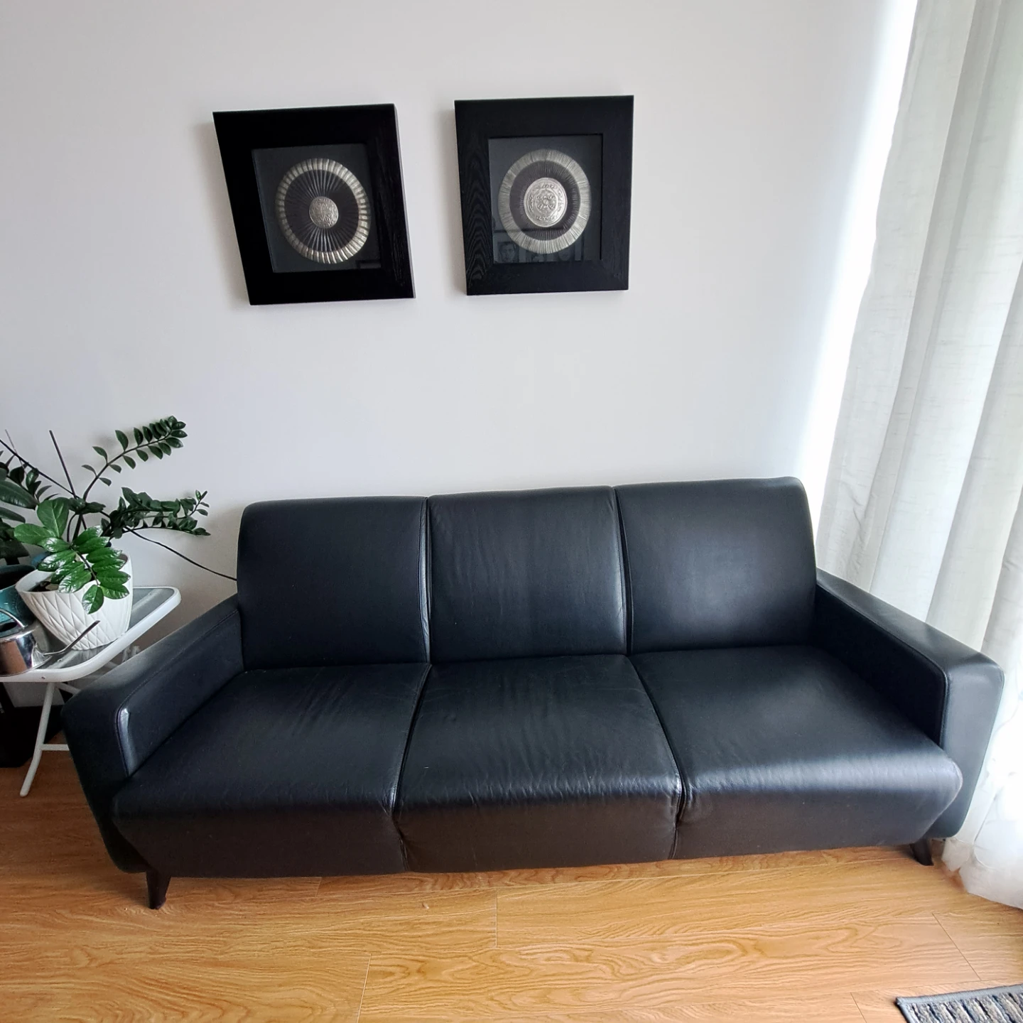 2 Black Leather Sofas in good condition