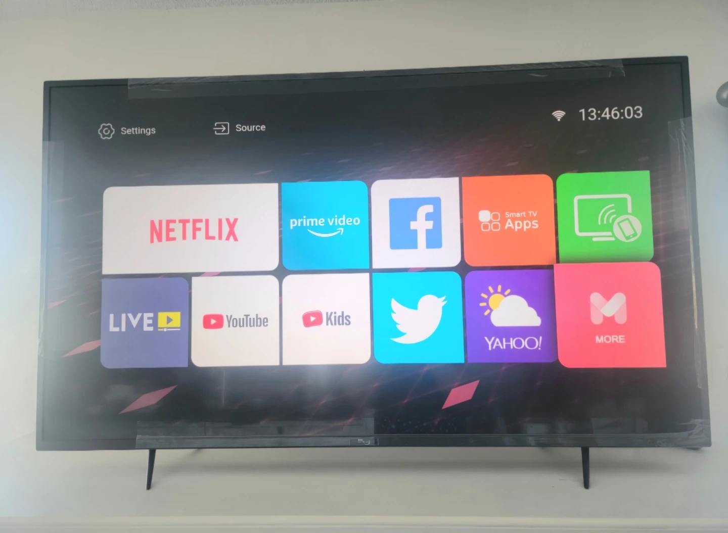 55 inch TV with a Remote Control