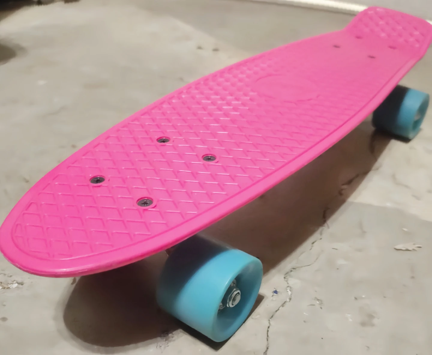 Pink Cruiser Skateboard with Blue Wheels