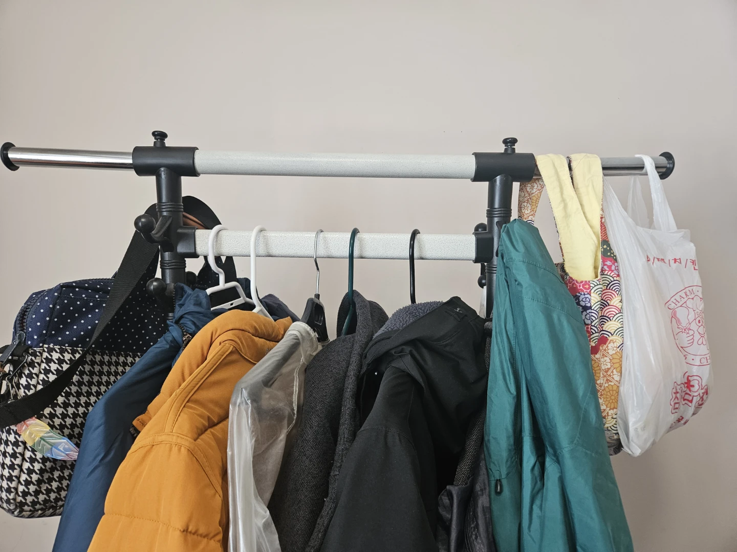 Rolling clothes rack with bottom shelf - photo 4