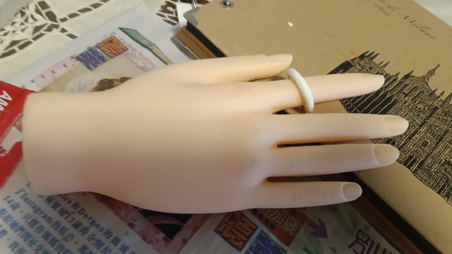 Mannequin Hand with White Ring