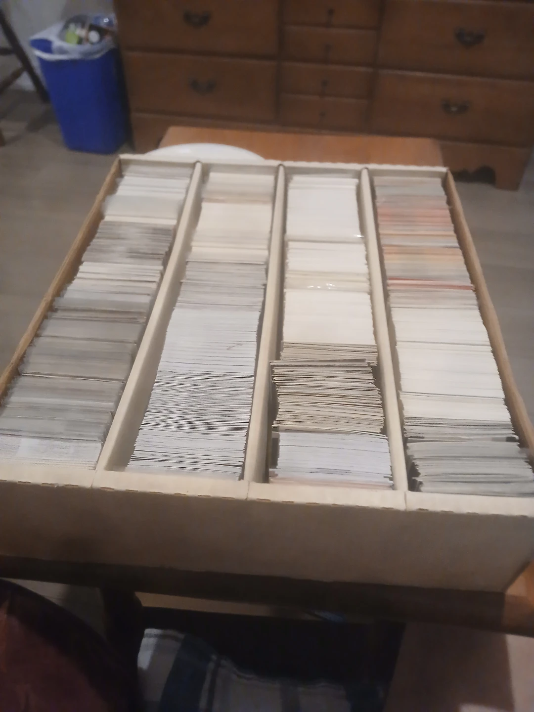 Assorted sports cards from the 90s up to 2023