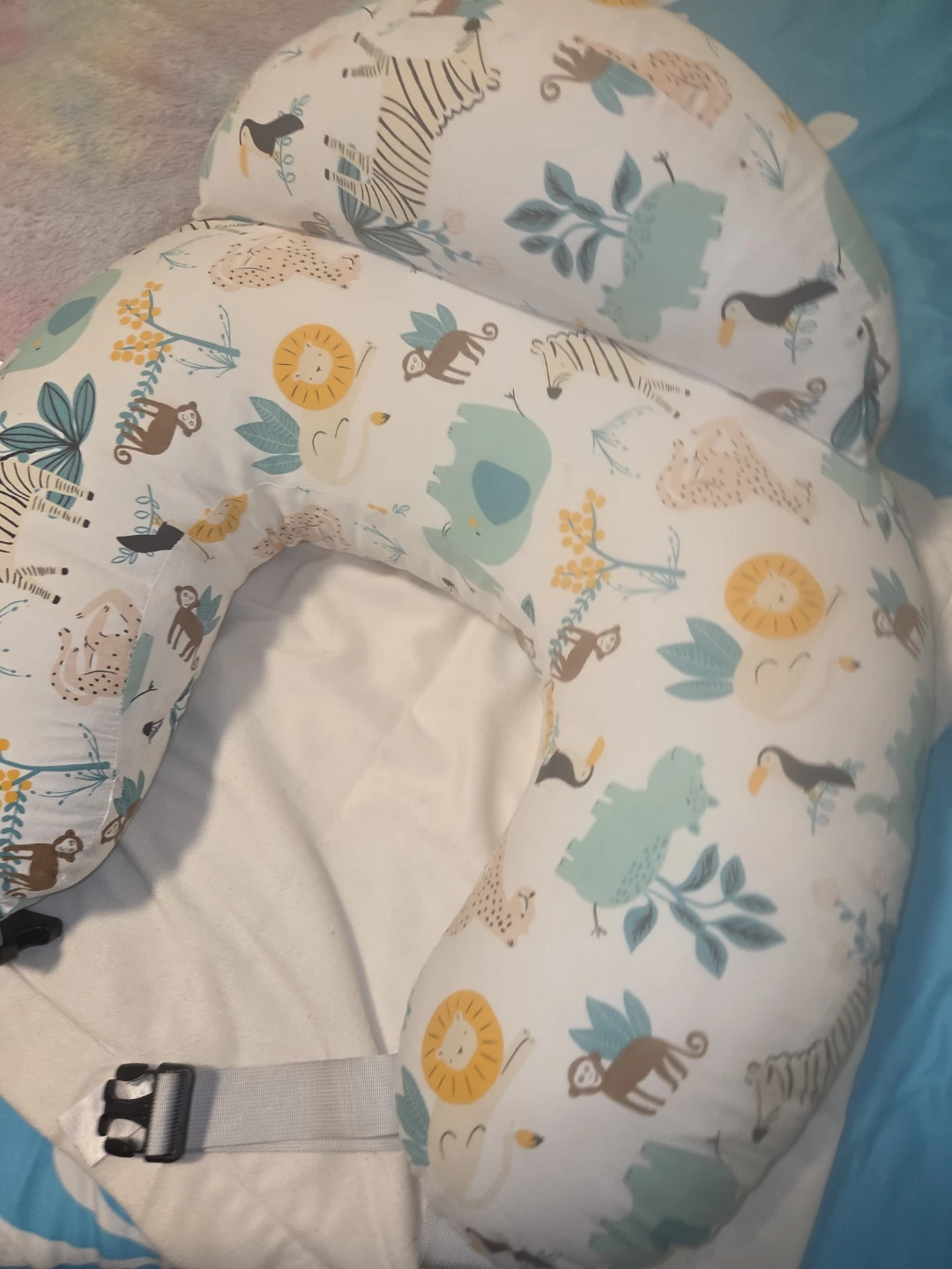 Breastfeeding pillow with a removable cover