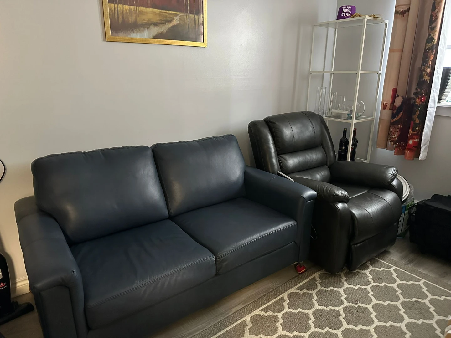 Dark Blue Two-Seater Sofa and Black Recliner Chair