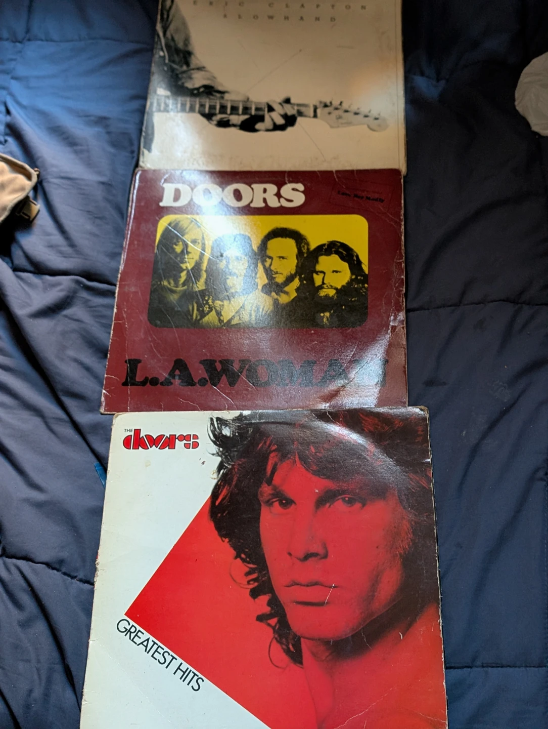 3 classic vinyls up for grabs. Eric Clapton the Doors