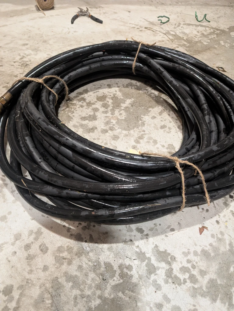 Green and black Garden Hose