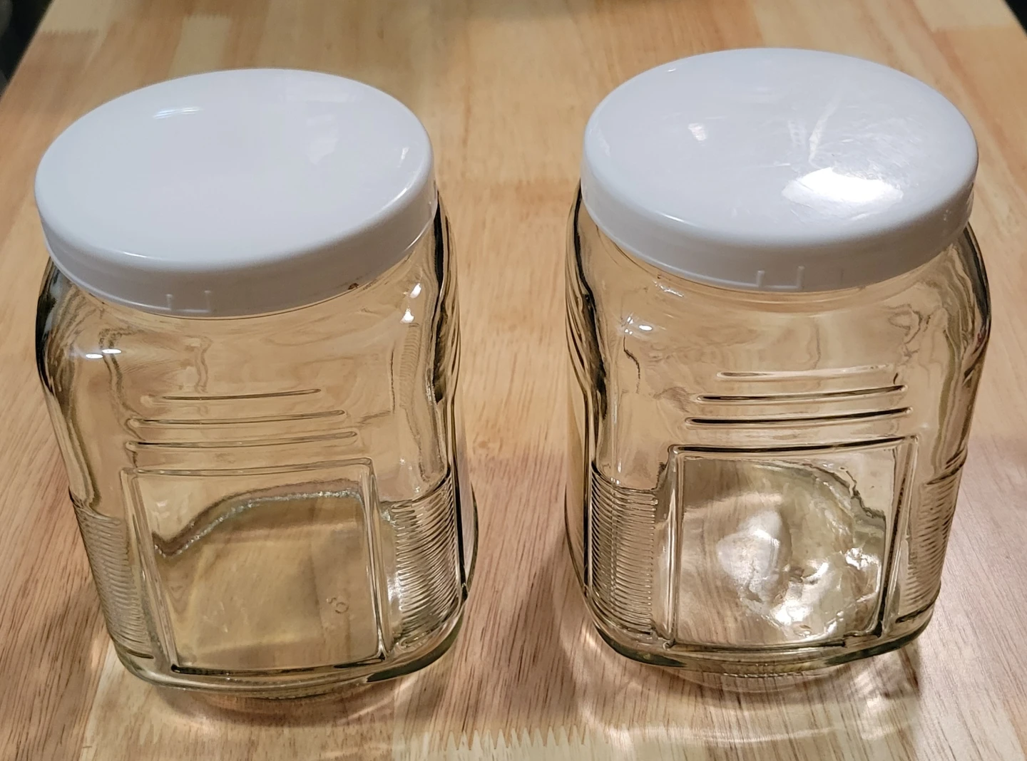 Set of 2 Glass Storage Jars with White Lids