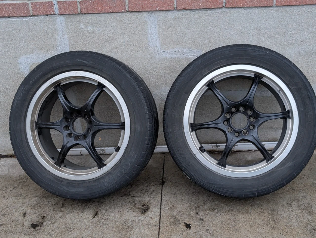 Two Aftermarket 17" 5-Spoke Black Rims with Tires P215 55/R17