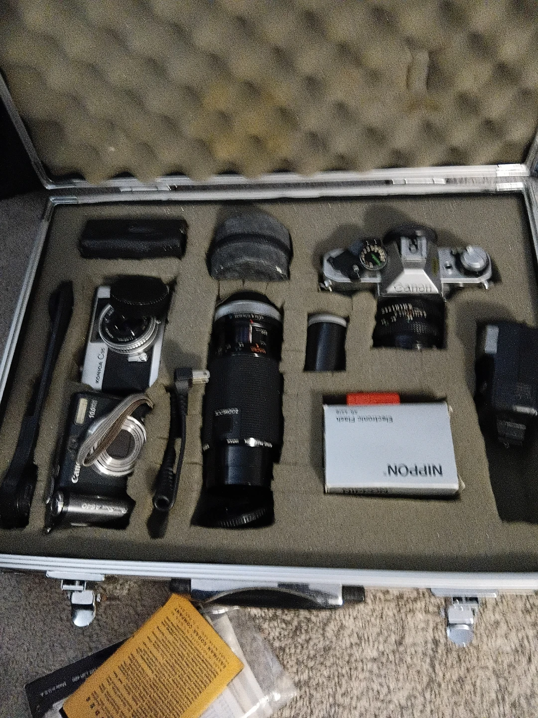 Canon AE-1 Program Camera with Konica C35 and Accessories