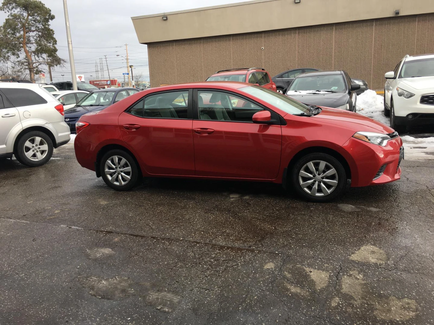 Red Toyota Corolla LE Sedan - photo 3