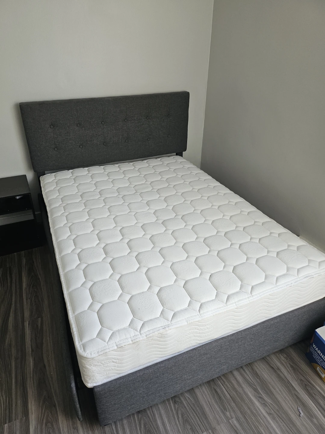 Double-sided bed frame with basket storage