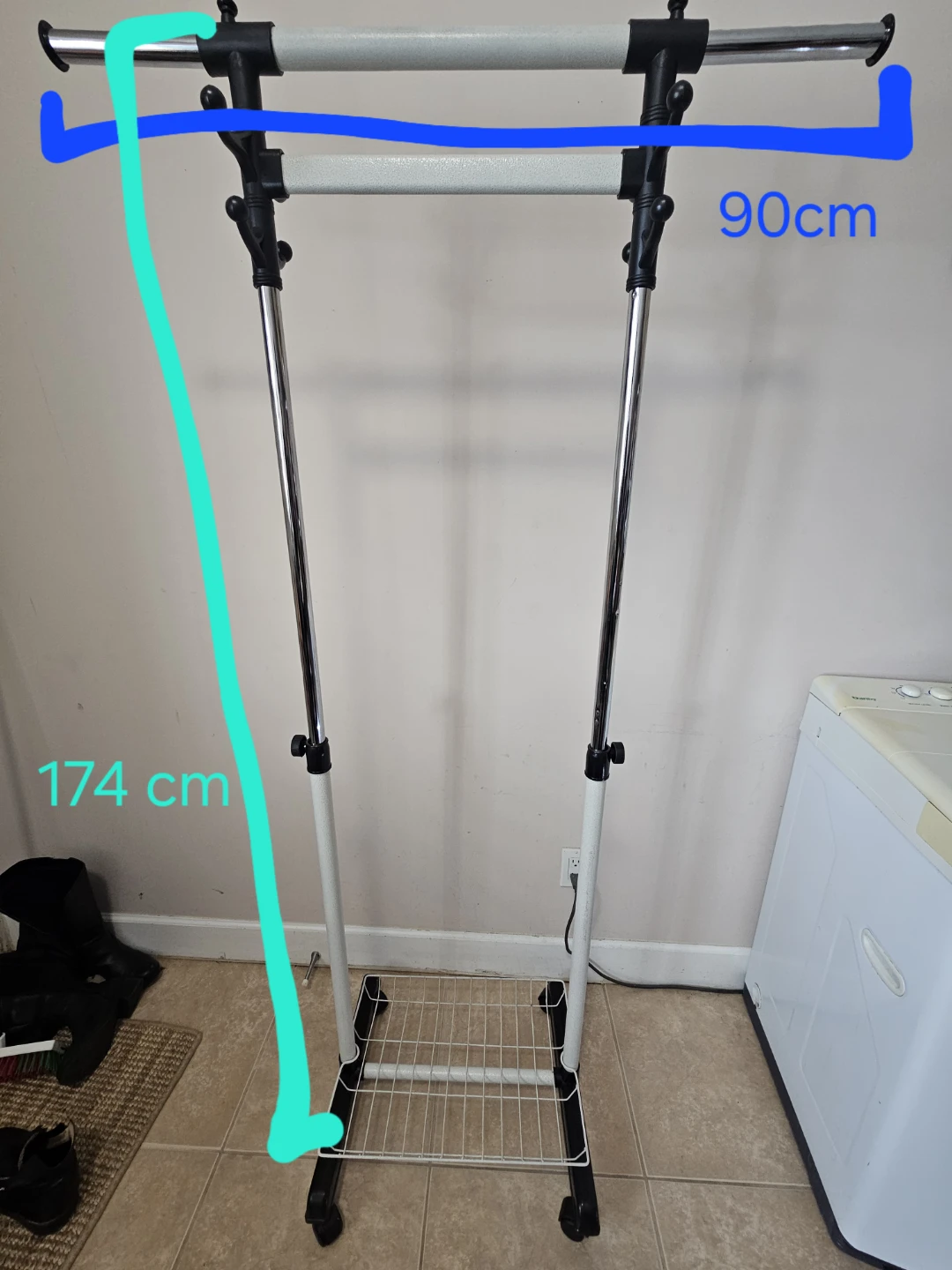 Rolling clothes rack with bottom shelf
