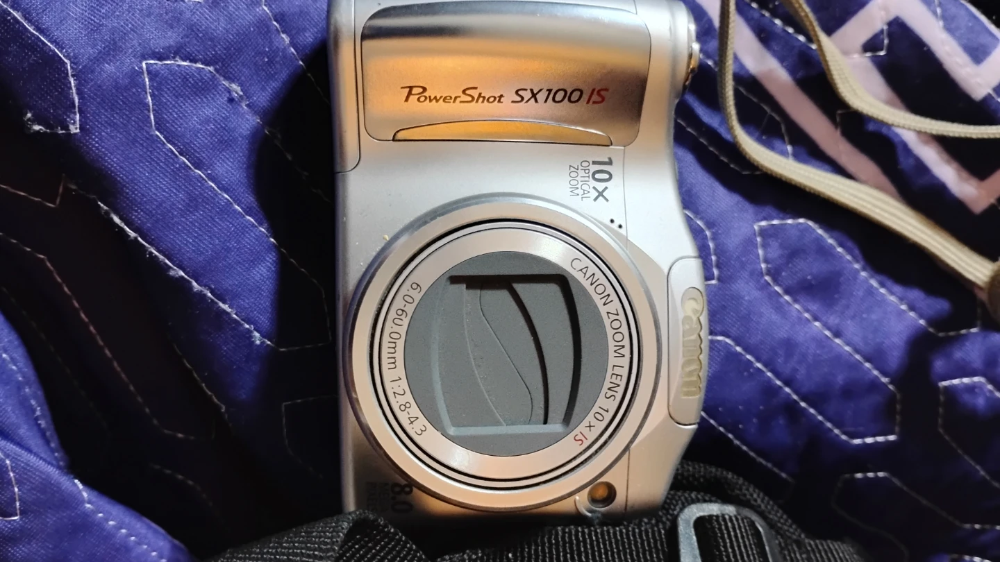 Canon PowerShot SX100 IS Digital Camera - photo 3