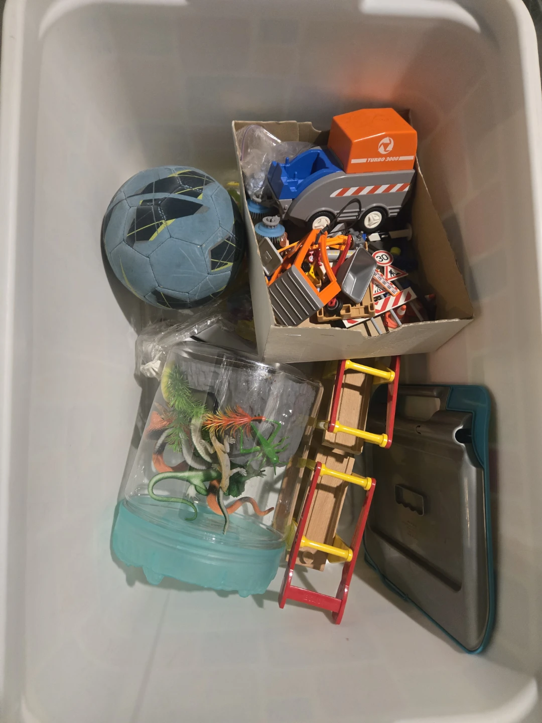 Assorted Toy Lot: Soccer Ball, Dinosaur Habitat, and Toy Truck