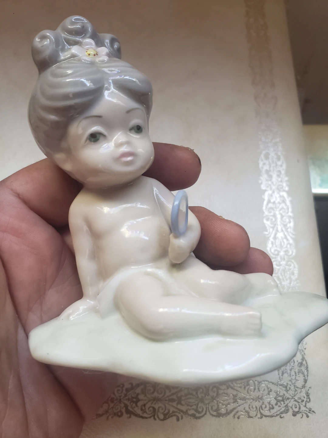 Casades Porcelain Figurine of a Baby Girl with Ring