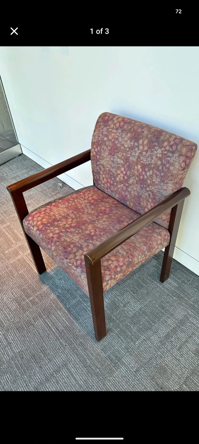 Armchair with patterned upholstery and wood frame