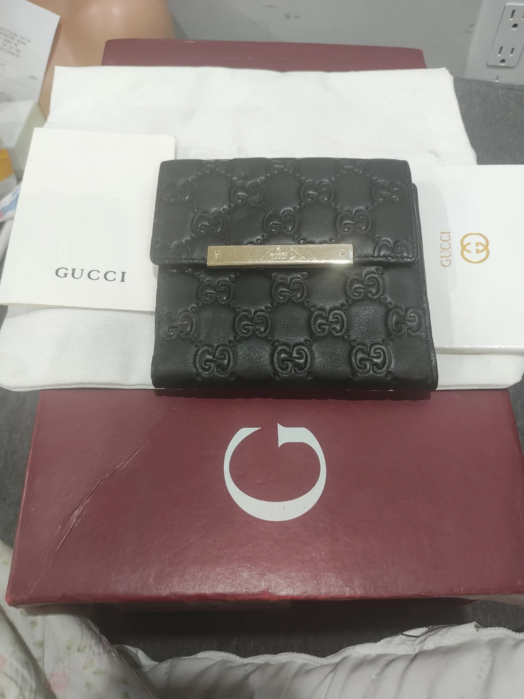 Black Leather Gucci GG Embossed Wallet